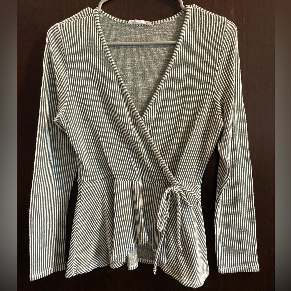 Caution to the wind long sleeve top. Non-smoker, lightly worn.